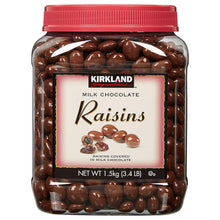 Kirkland milk chocolate raisins jar with red lid, dark brown glossy covered raisins