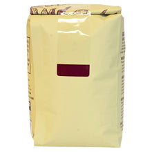 Whole bean coffee bag in light tan with maroon label window