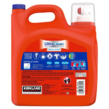 Orange liquid laundry detergent bottle back label with Kirkland Signature and UltraClean