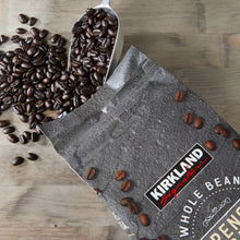 Whole bean French roast coffee bag with scattered coffee beans