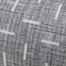 Gray patterned pet bed fabric close-up with woven texture