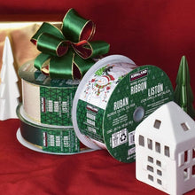 Kirkland Signature wire-edge ribbon spools with green satin ribbon and a matching bow.