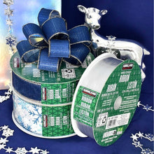 Kirkland Signature wire-edge ribbon spools in blue with gold edging and a matching bow.