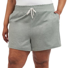 Women's lightweight green shorts with elastic waistband, drawstring, and side pockets