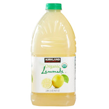 Organic lemonade bottle with green cap and pale yellow liquid