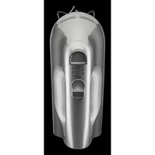 6-speed control dial on hand mixer handle, brushed silver body with speed markings