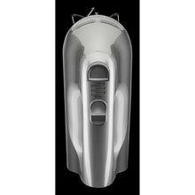 Hand mixer front with speed settings 1–6 and a control slider.