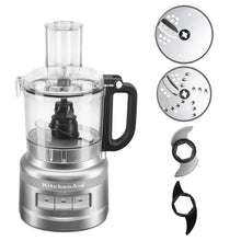 Food processor with clear work bowl, black lid, and brushed metal control panel