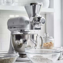 Grain mill attachment on stand mixer with metal hopper and side chute