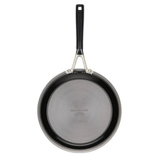 Round nonstick skillet bottom with gray base and black outer rim