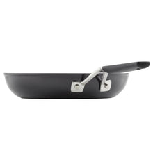 Nonstick sauté pan with black body and silver handle bracket