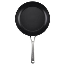 Black nonstick fry pan with stainless handle and smooth circular cooking surface