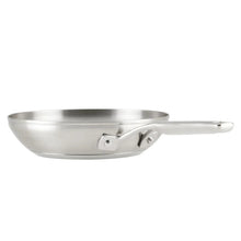 Stainless steel frying pan with long handle and side helper loop, interior visible