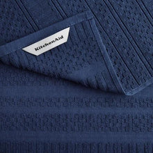 Navy cotton kitchen towel with textured waffle weave and KitchenAid label