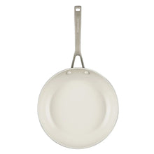 Light ceramic nonstick fry pan with metal handle, round cooking surface