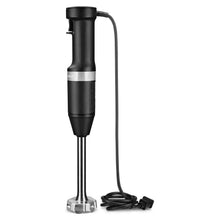 Black corded hand blender with blending shaft and base stand, power cord