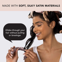 Satin flexi hair curling rod, rosewood satin wrap, shown being applied