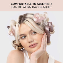 Satin-wrapped flexi hair curling rods on blonde hair, light pink and cream