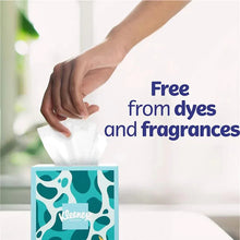 Kleenex dye- and fragrance-free facial tissues, hand pulling white tissue
