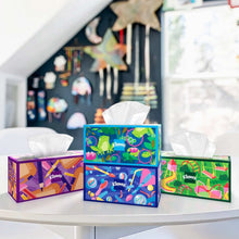 Facial tissue boxes displayed on shelf, multiple colorful boxes with white tissues protruding