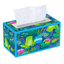 Kleenex tissue dispenser box with colorful leaf pattern and open white tissue
