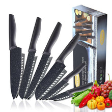 Black kitchen knife set with granite-style blades and blade guards, in retail box