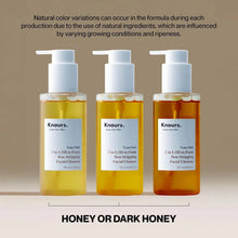 Facial cleanser bottles with honey-gold to dark honey liquid, three pump bottles