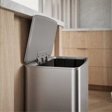 Kohler 45L stainless steel trash can with lid open to reveal the inner bin