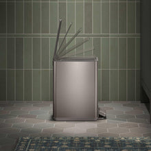Stainless step trash can with open lid and metal lift rods behind the rim.