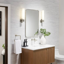 Rectangular framed mirror with rounded corners and silver edge, wall-mounted