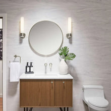 Round framed bathroom mirror with silver-gray edge