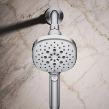 Chrome overhead handshower with round spray face and mode button