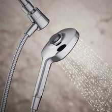 Chrome handshower head with diverter and spray nozzles, close-up