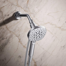 Chrome wall-mounted handshower with round spray plate and flexible hose