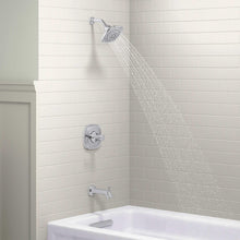 Chrome shower trim with overhead showerhead and mixing valve above tub