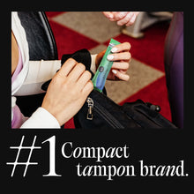Kotex Click compact tampon pack held in hand, size S