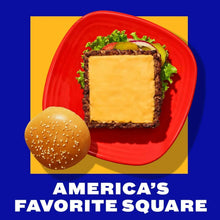 American cheese square on toasted bread with lettuce and a hamburger bun