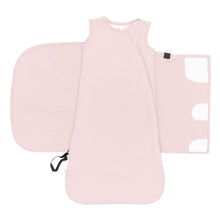 Pink baby sleep bag swaddler with front zipper and folded arm opening