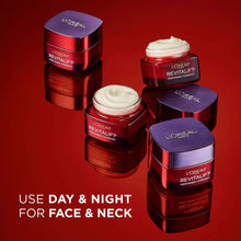 Set of face moisturizer jars with white cream on top