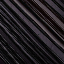 Mascara brush bristles on applicator wand