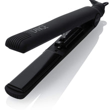 Black ceramic flat iron hair straightener with ridged top and clamp handle