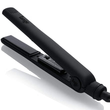 Black ceramic flat iron hair straightener with dual heating plates and control panel