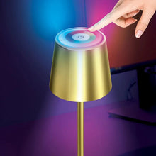 Gold LED patio touch lamp with hand pressing top touch control