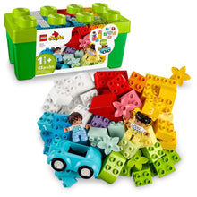 Green LEGO DUPLO storage brick box with mixed colorful building pieces and flowers