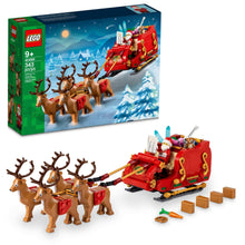 Santa's sleigh building set box with red sleigh and brown reindeer figures