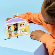 LEGO Friends Bunny Hotel playset on table with figures inside