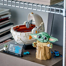 Green Grogu figure in tan LEGO droid body with white dome and side console