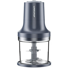 Grey food chopper with clear bowl, central blade shaft, and compact countertop base