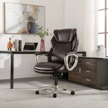 Dark brown executive office chair with padded headrest and armrests on rolling base.