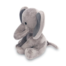 Gray plush elephant toy kneeling in profile, with long ears and stitched eyes.
